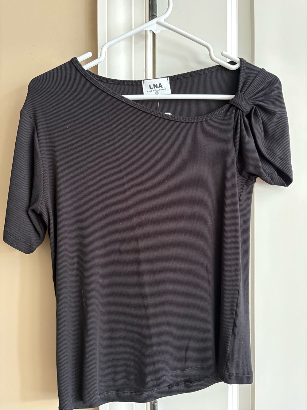 LNA black asymmetrical shoulder top